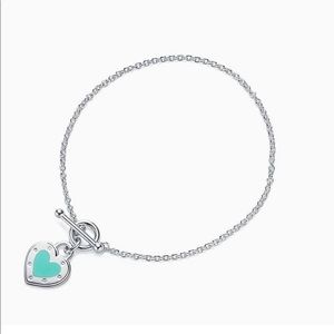 Tiffany silver bracelet with blue emerald hear